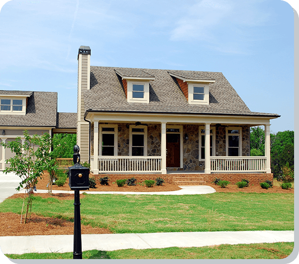 A house with a lot of grass in front